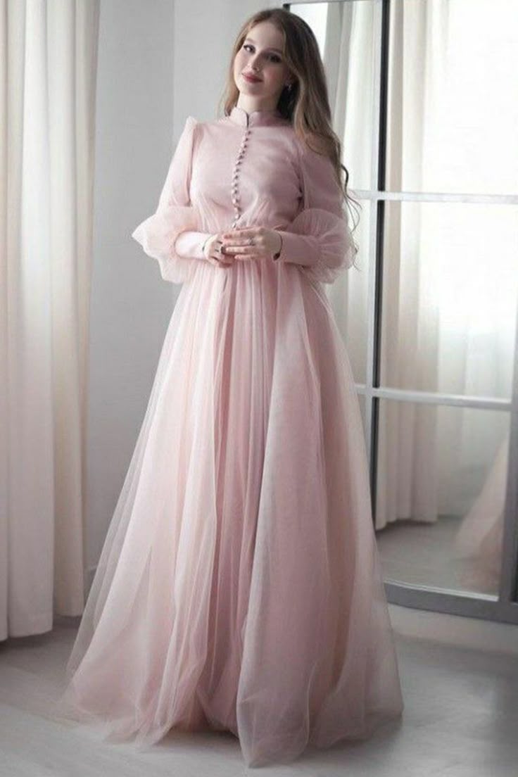 Shimmering Gown with Sleeves – Designed to Light Up Your Night